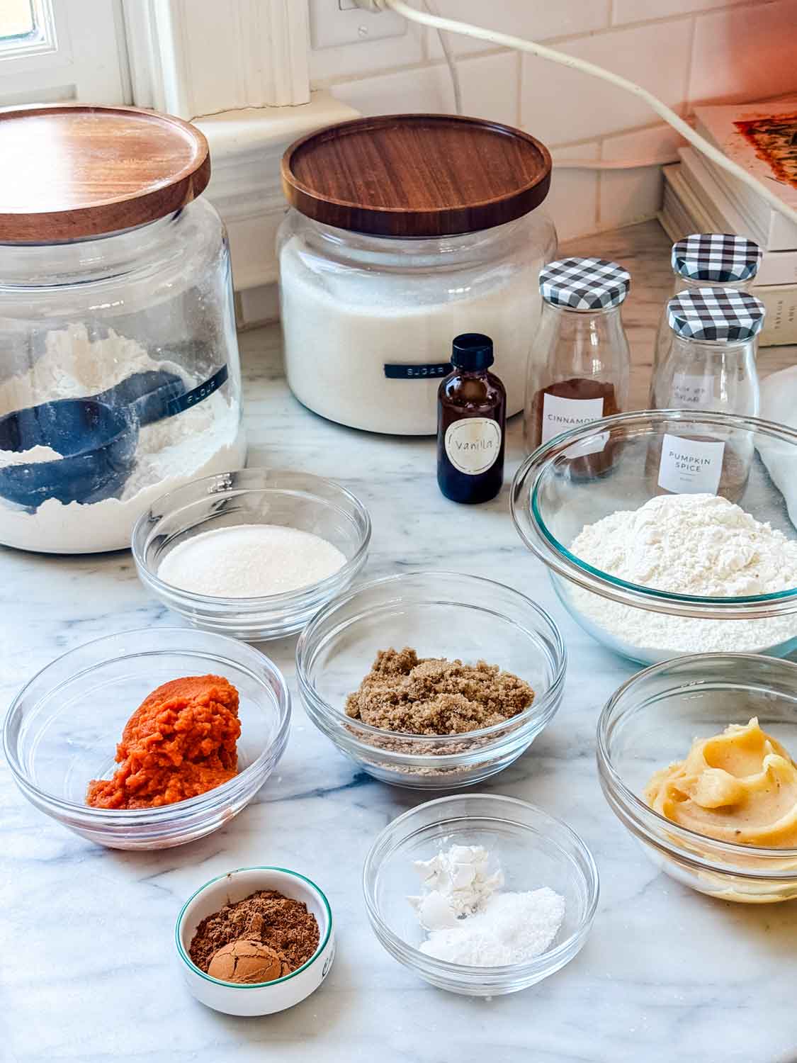 Ingredients to make pumpkin snickerdoodle cookies.