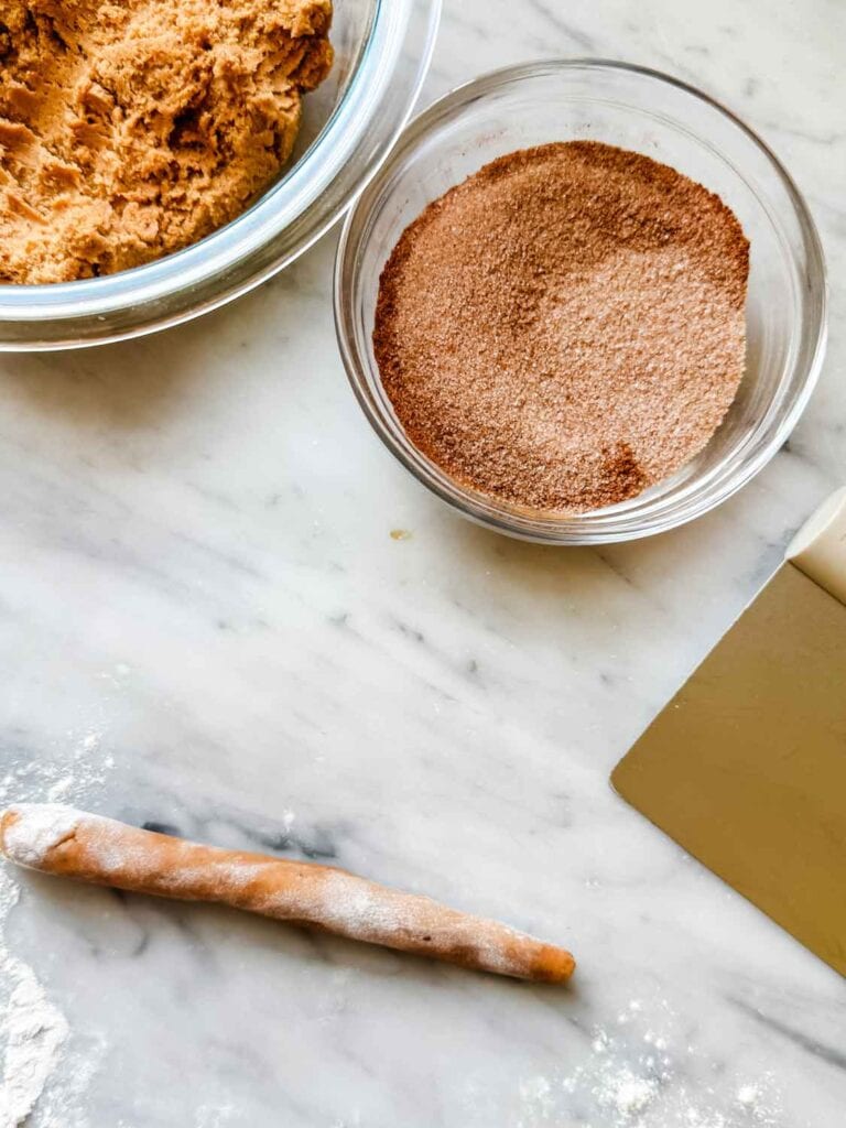 Cookie dough, cinnamon sugar, cookie roll.