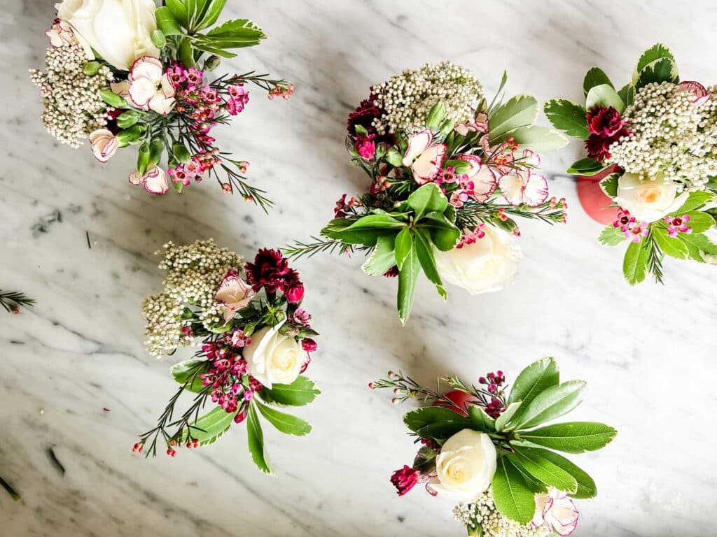 small flower arrangements on marble 