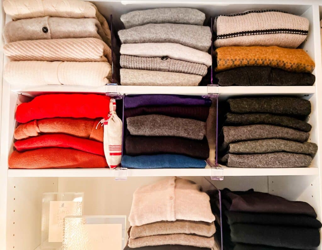 Ideas on How to organize a small clothes closet, stacks of sweaters 