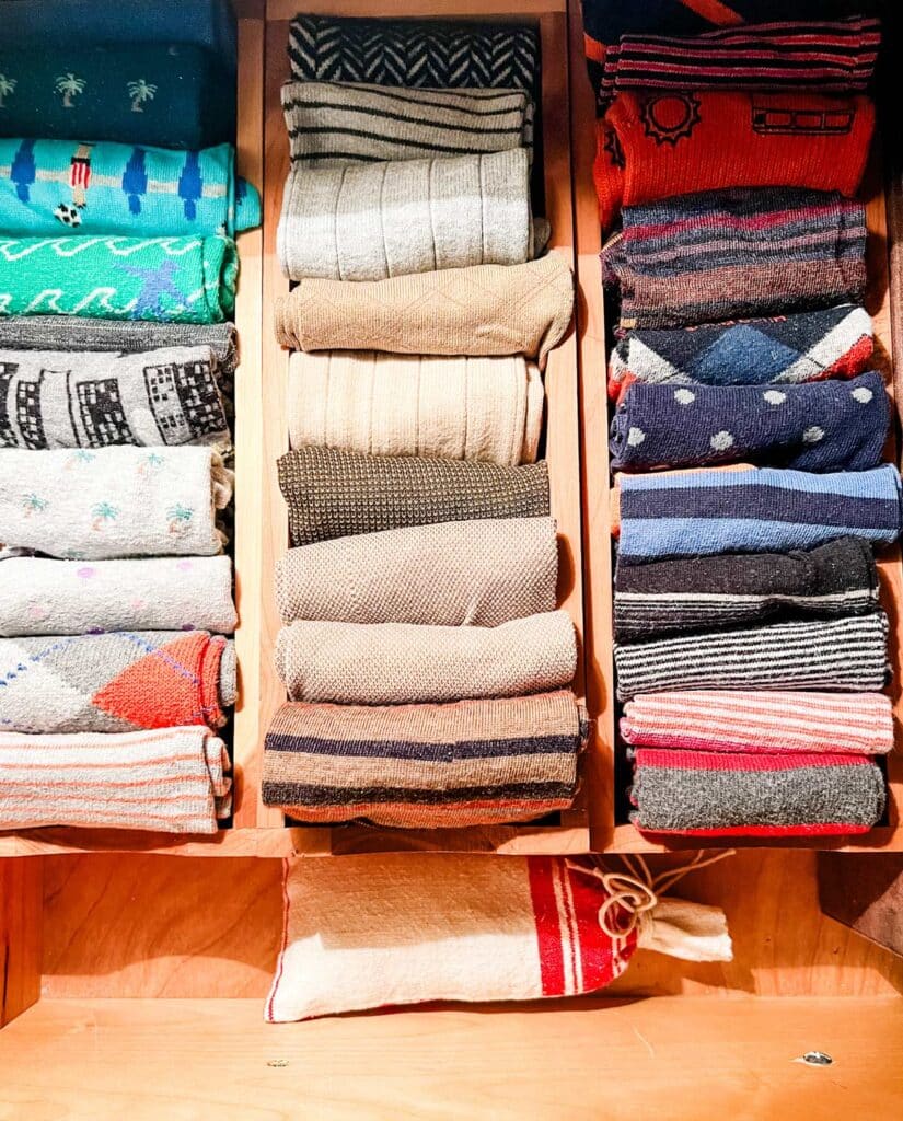 ​Ideas on How to Organize a Small Clothes Closet-cedar sock boxes to keep your socks organized.