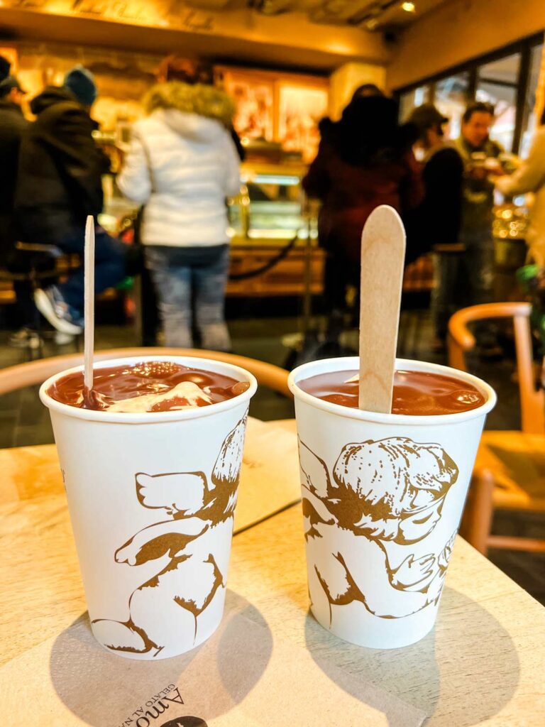 Two hot chocolate affogatos on a table at Amorino Gelato Shop in New York City.