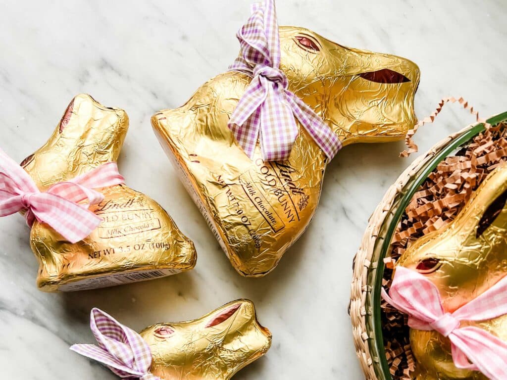 The Best Easter Basket Gift Ideas for Teen Girls 2024 - Paatel gingham bows on gold foil wrapped chocolate bunnies 