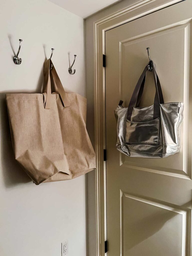 hang the laundry bag and travel bag that also stores travel items like adapters.