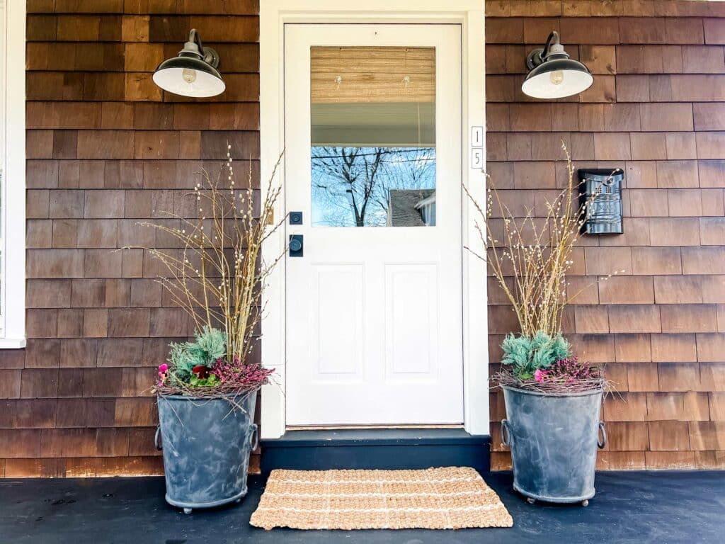 How to keep your porch planters from leaking water only requires a few easy steps. These planters won't leak on my black stained wood porch.