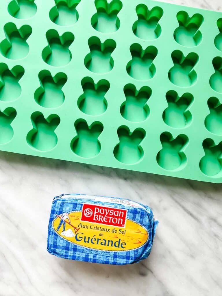 Rubber molds formed in the shape of bunnies in which you can mold salted French butter.
