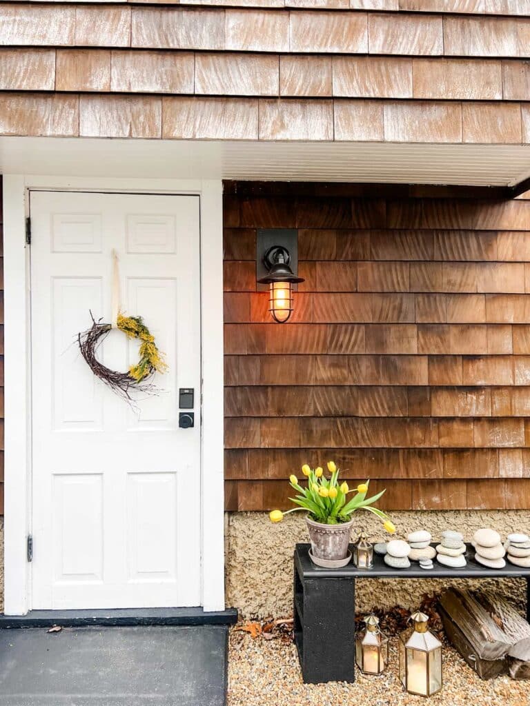 Cottage entryway for spring with a Barn Light Electric sconce 