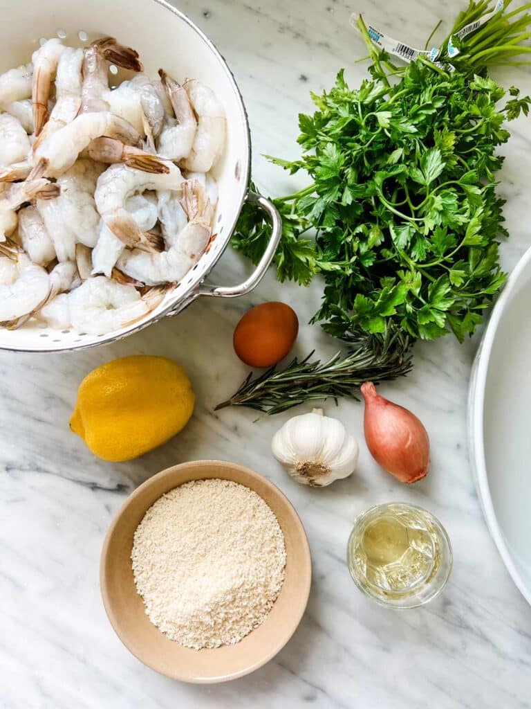 All the ingredients for making Ina Garten's shrimp scampi that is the perfect easy dinner for any occasion.