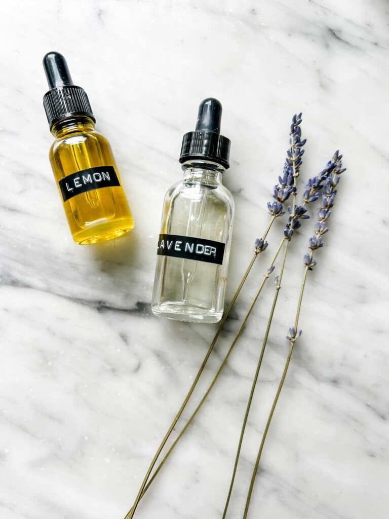 Lemon and lavender essential oils for to make natural DIY moisturizing hand cream.