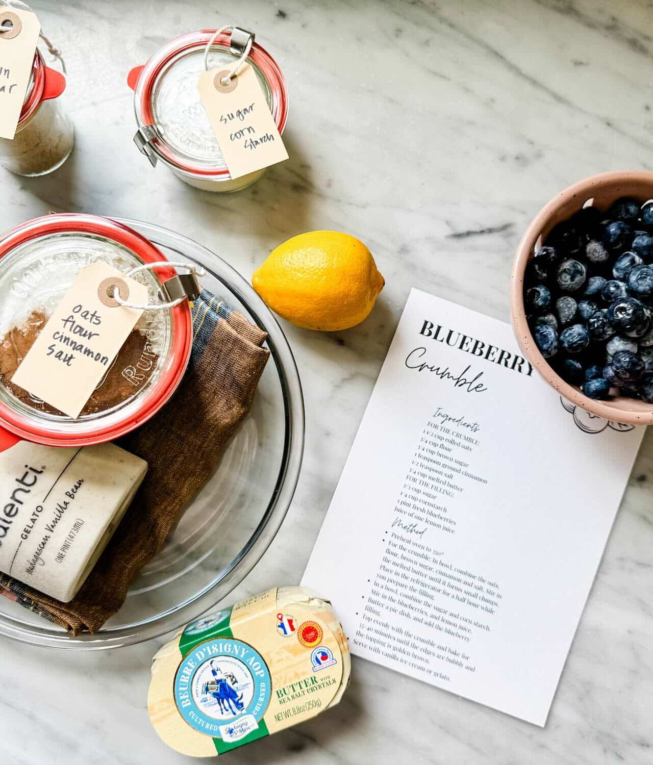 All the ingredients for making blueberry crumble are pre-measured and in glass jars. A pie baking dish and a linen tea towel are included to make the perfect hostess gift.