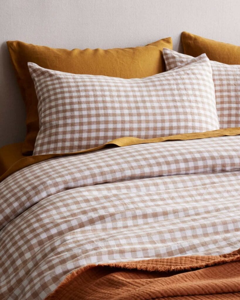 gingham sham, duvet, gold pillow.