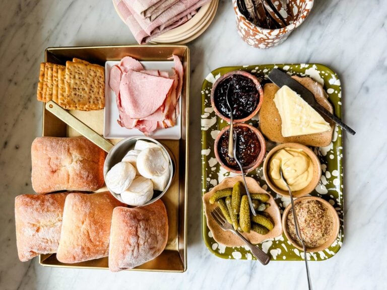 All the ingredients to make savory s'mores are lined up in a tray and ready for guests to arrive.