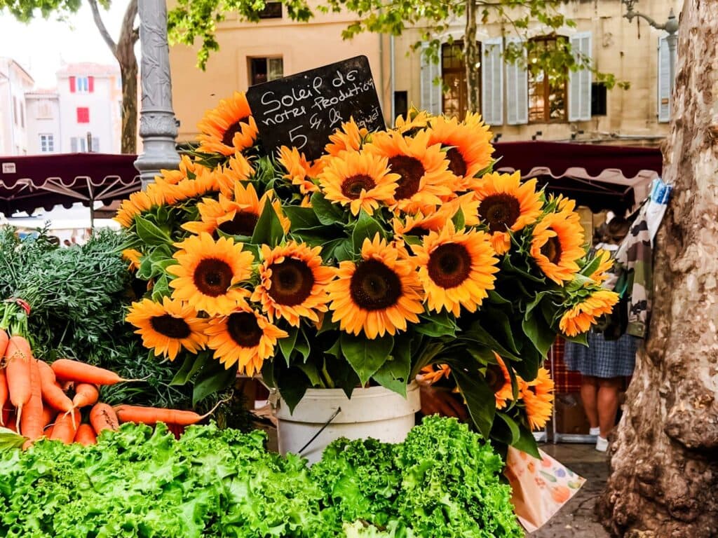 Sunflowers on display at Market Day in Provence, France.