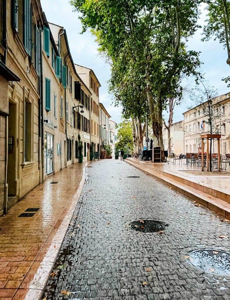 An empty afternoon street in Avignon, France.