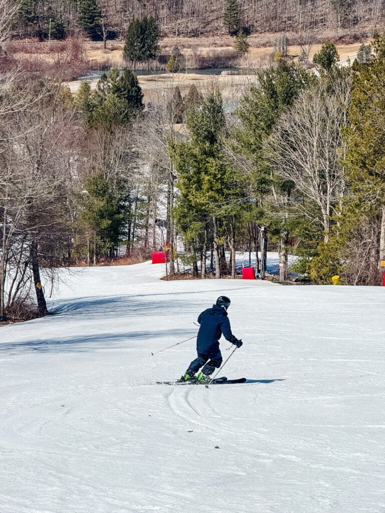 A skier making a turn on the slopes at Mohawk Mountain Ski Resort.