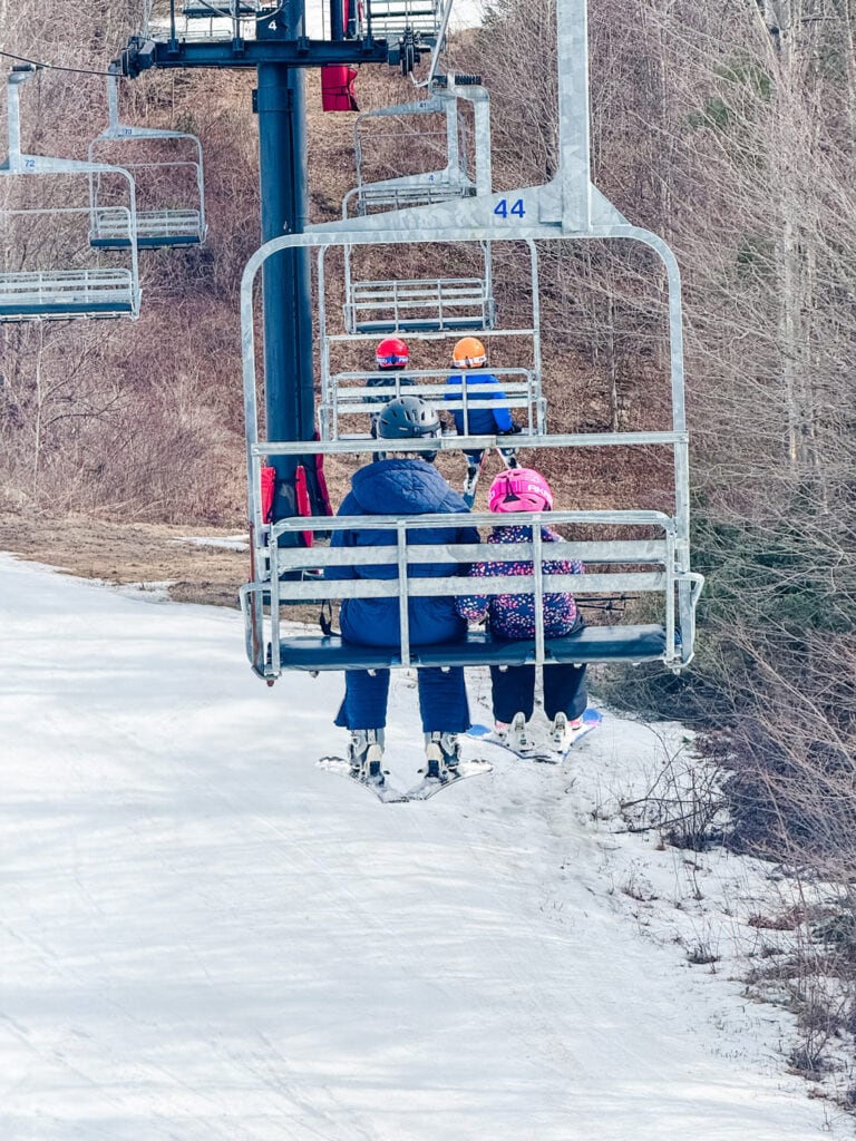 A mother and daughter ride the chairlift together at Mohawk Mountain Ski Resort.