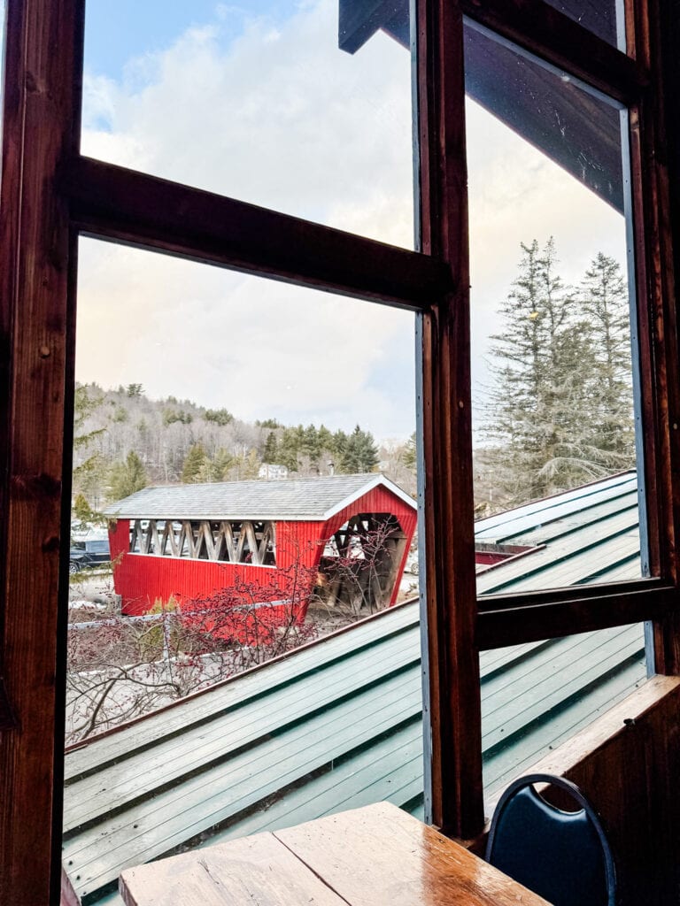 A view from inside the lodge of the covered bridge at Mohawk Mountain Ski Resort.