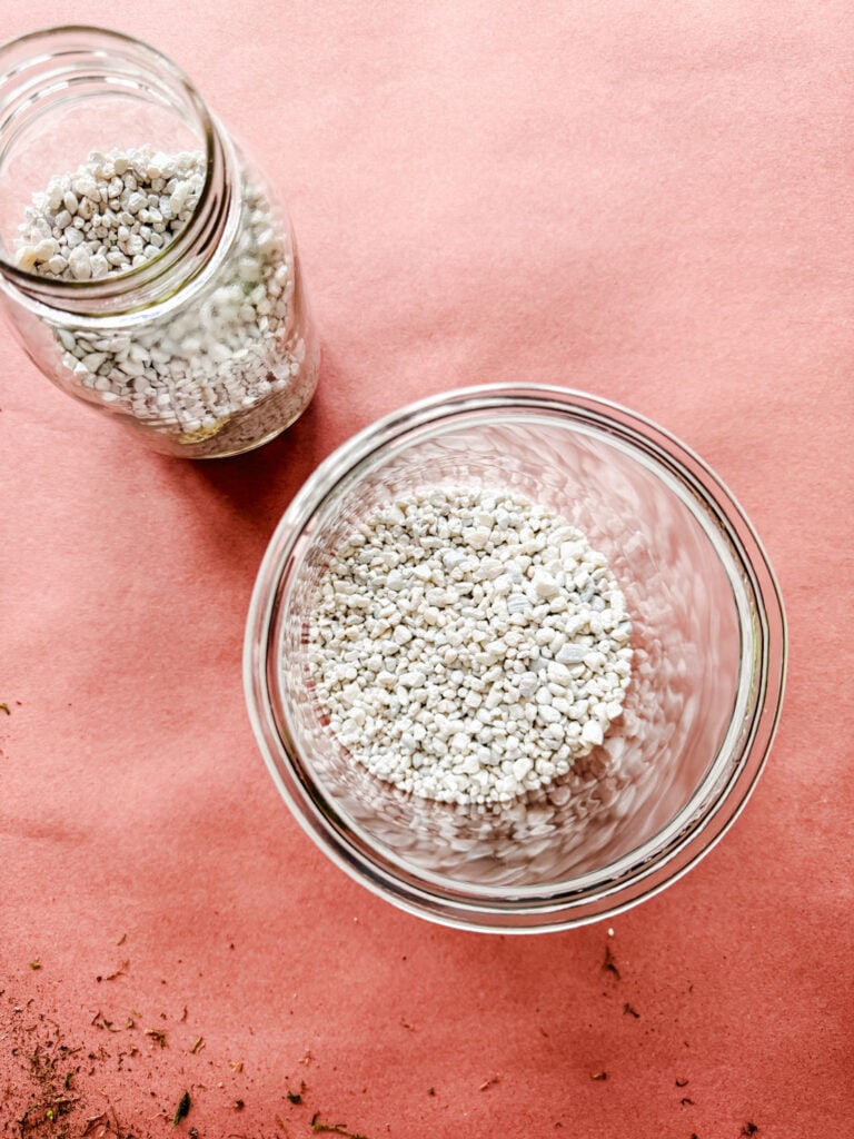 Small white stones on jars.