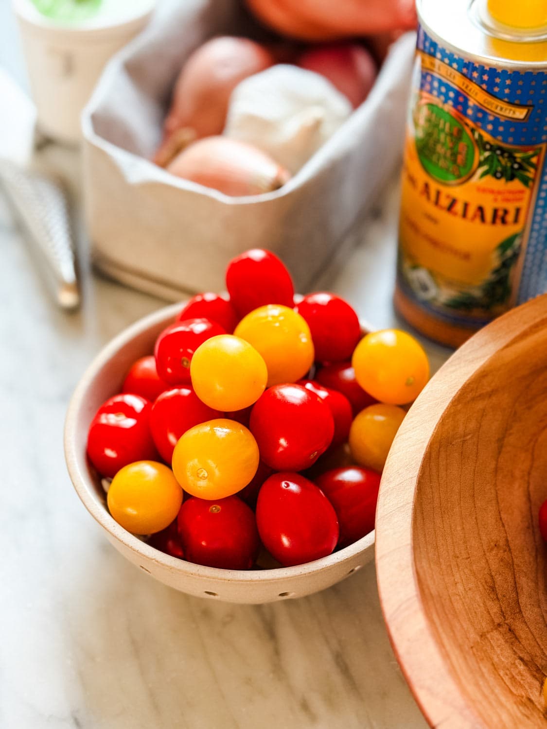 Tomatoes, garlic, shallots, and olive oil are some of the ingredients for this appetizer recipe.