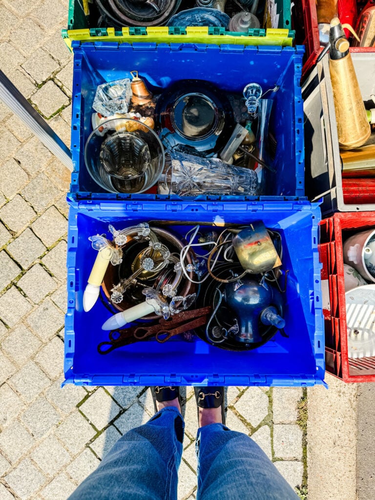 Blue bin with flea market finds.