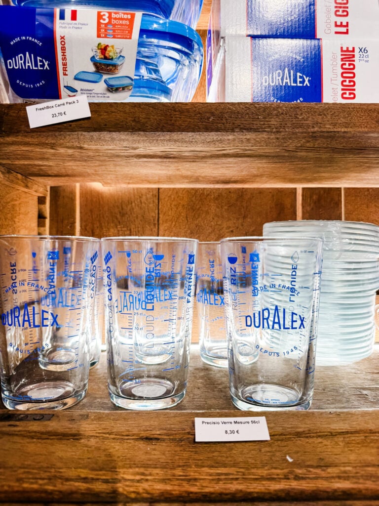 Duralex-branded glasses in a cabinet at the Duralex store in Paris.