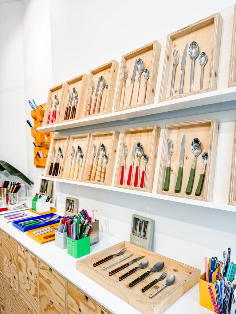 Many of the Sabre flatware designs are on display on the wall inside the Paris Sabre store.