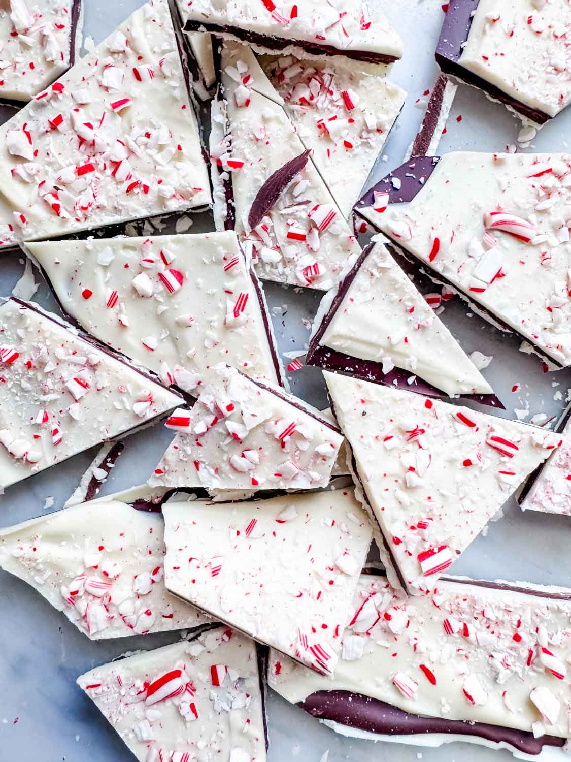 The finished chocolate peppermint bark is cut into edible chunks.