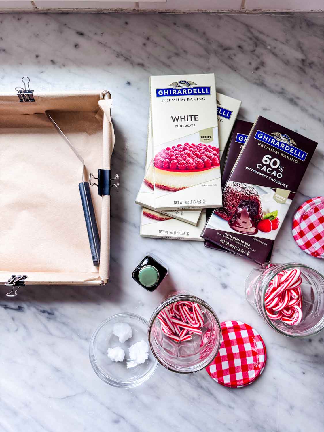 All the ingredients for chocolate peppermint bark is on the kitchen counter and ready for making.