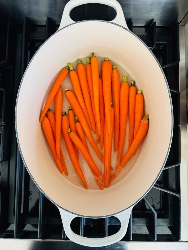 Carrots in Le Cresuet Dutch oven.