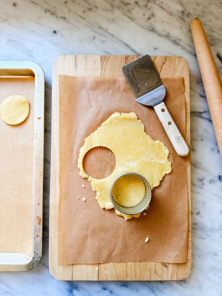 A 2 1/2" diameter cookie cutter is used to make cookie discs for sablés breton cookies.