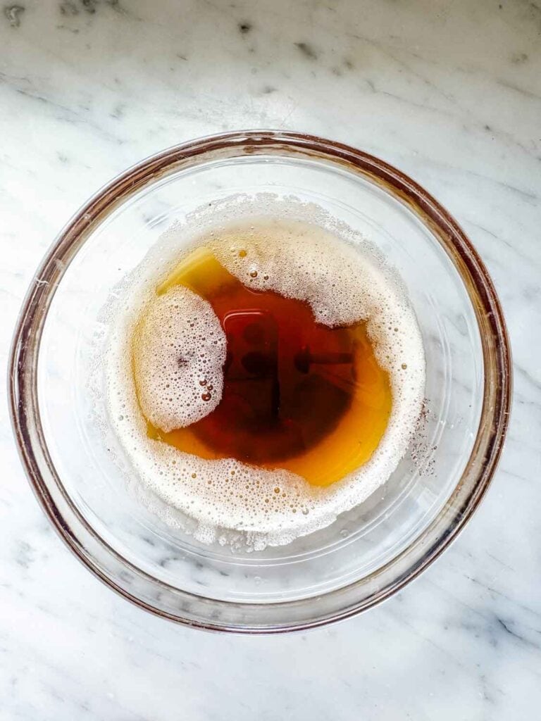 Browned butter is in a clear, heat-proof bowl.