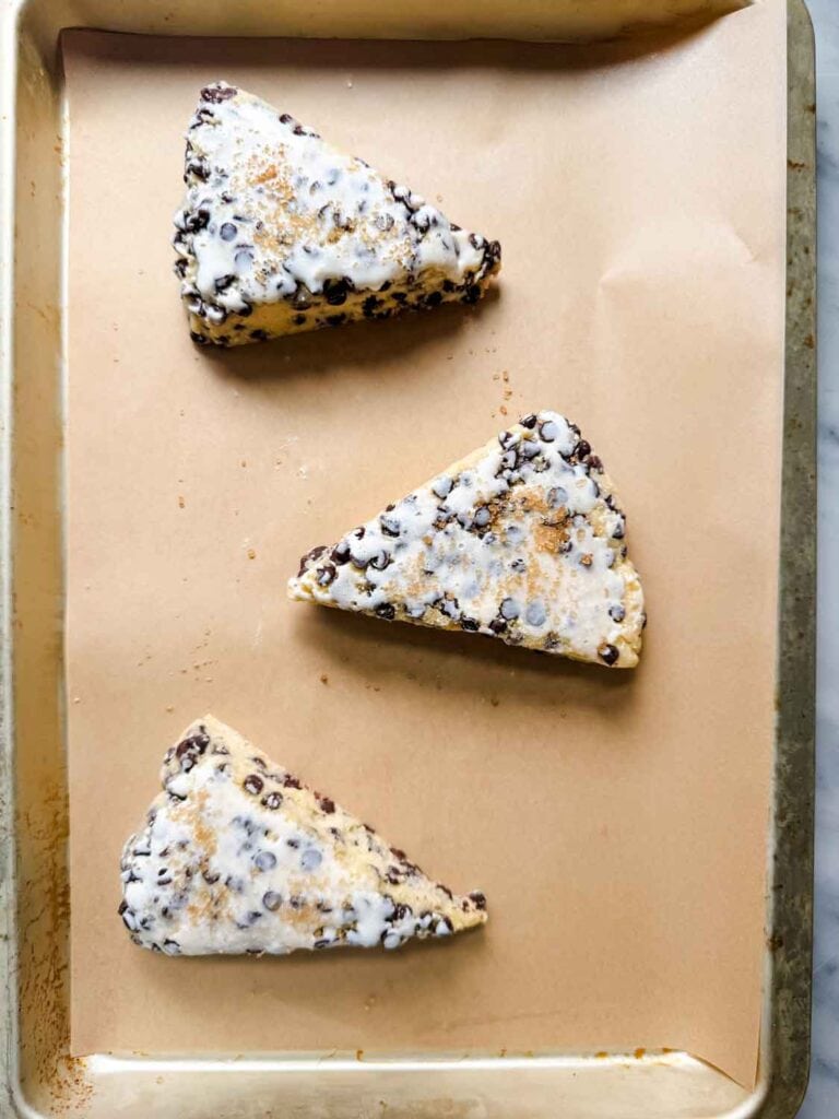 Scones on parchment paper.
