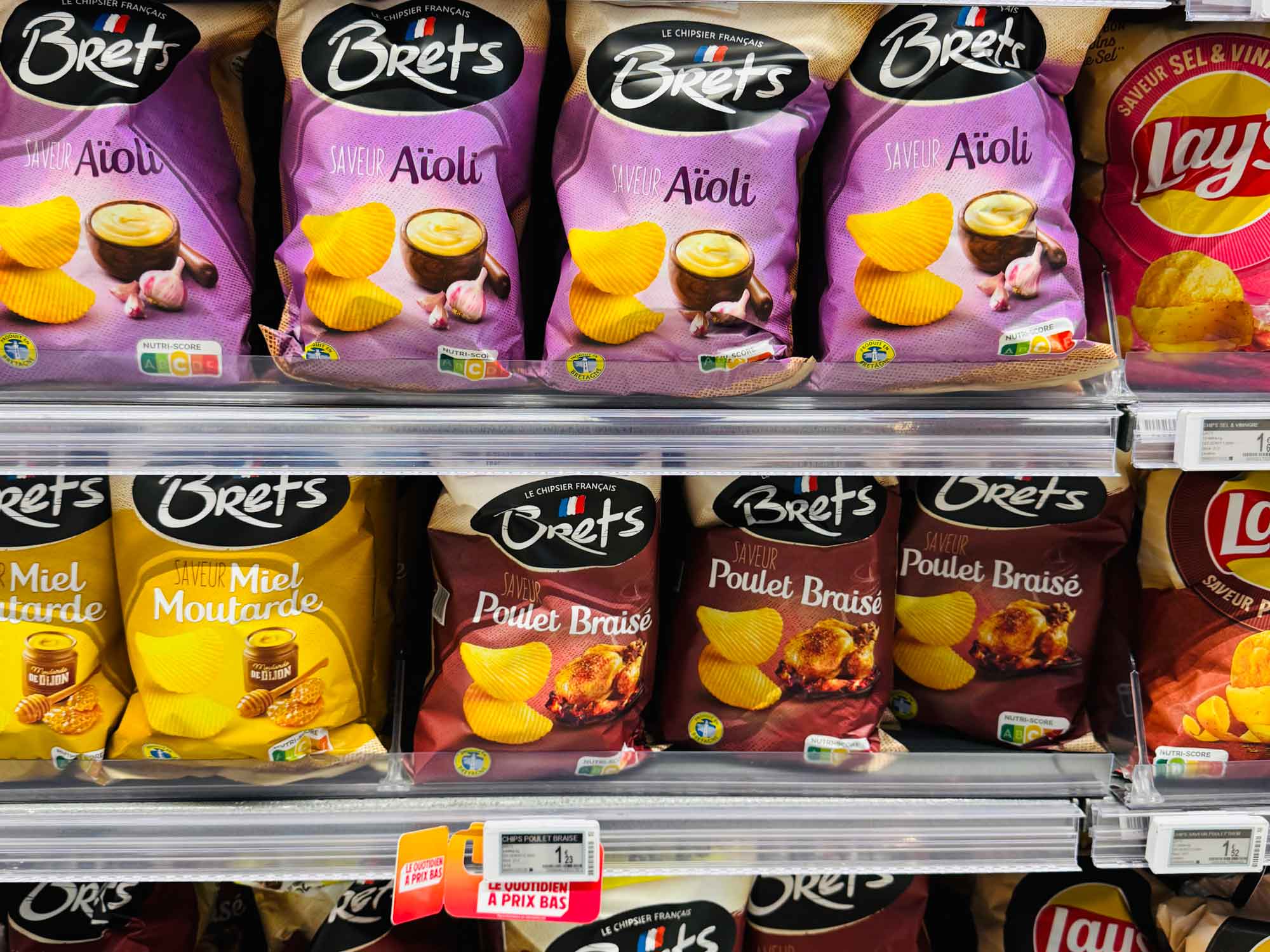 Favored potato chips that you can't find in United States grocery stores like the shelves of markets in France.