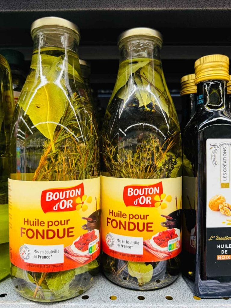 In French grocery stores, you can also find herb-infused oil for Fondue.