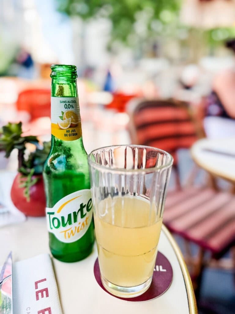 A lemon beer is served at a table at Le Raspail cafe and restaraunt in the 6th arrondissiment in Paris.