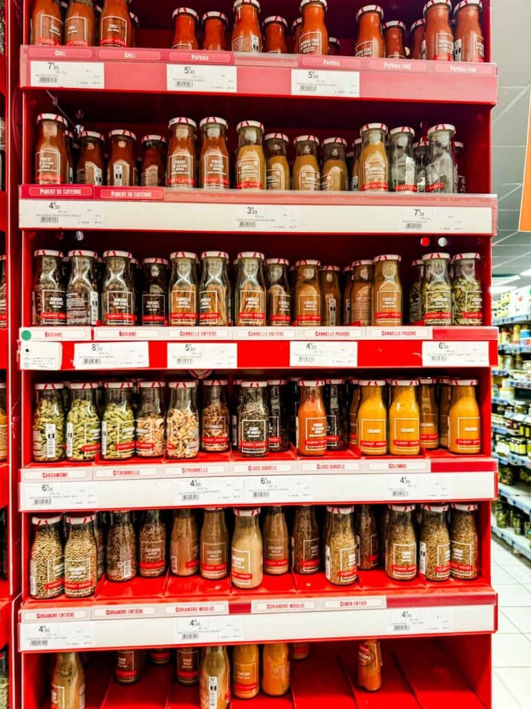 All kinds of herb and spices decorate this corner display at the Supermarché in Grignan, France.