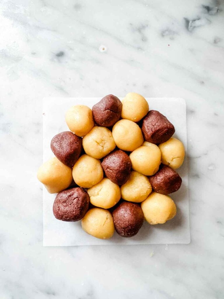 Vanilla and chocolate cookie dough, small dough balls.