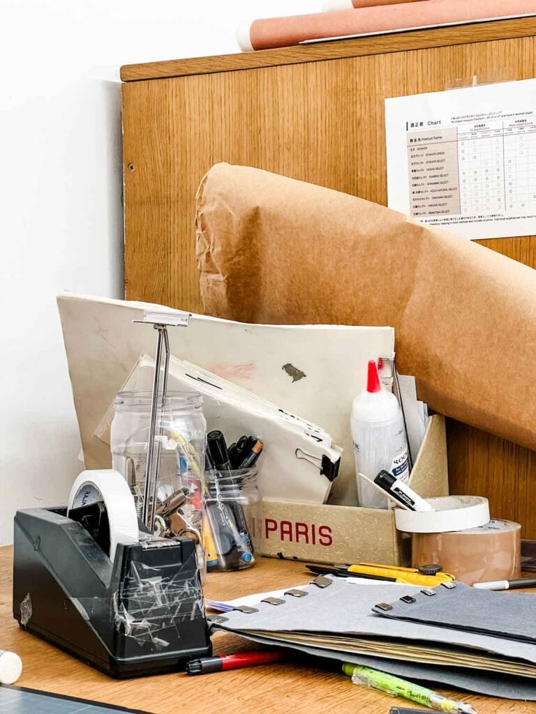 This is a worker's desk inside the Sennelier, a beautiful art supply store in Paris.