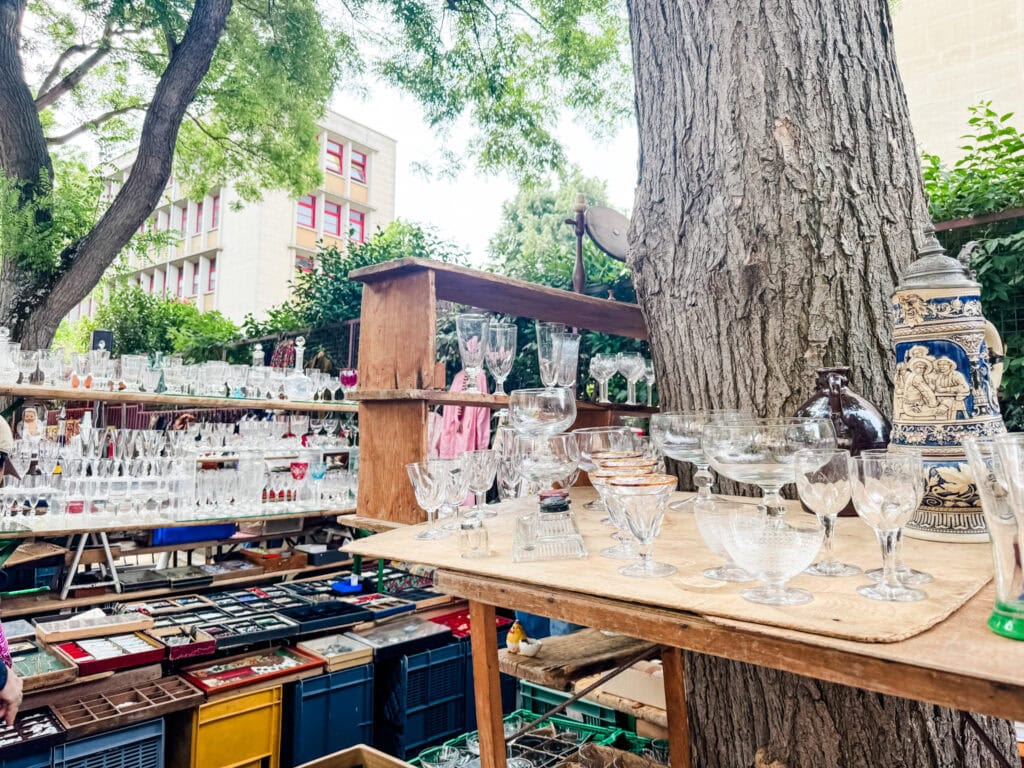 Vintage glassware is what this vendor specializes in at the Vanves Flea Market in Paris.