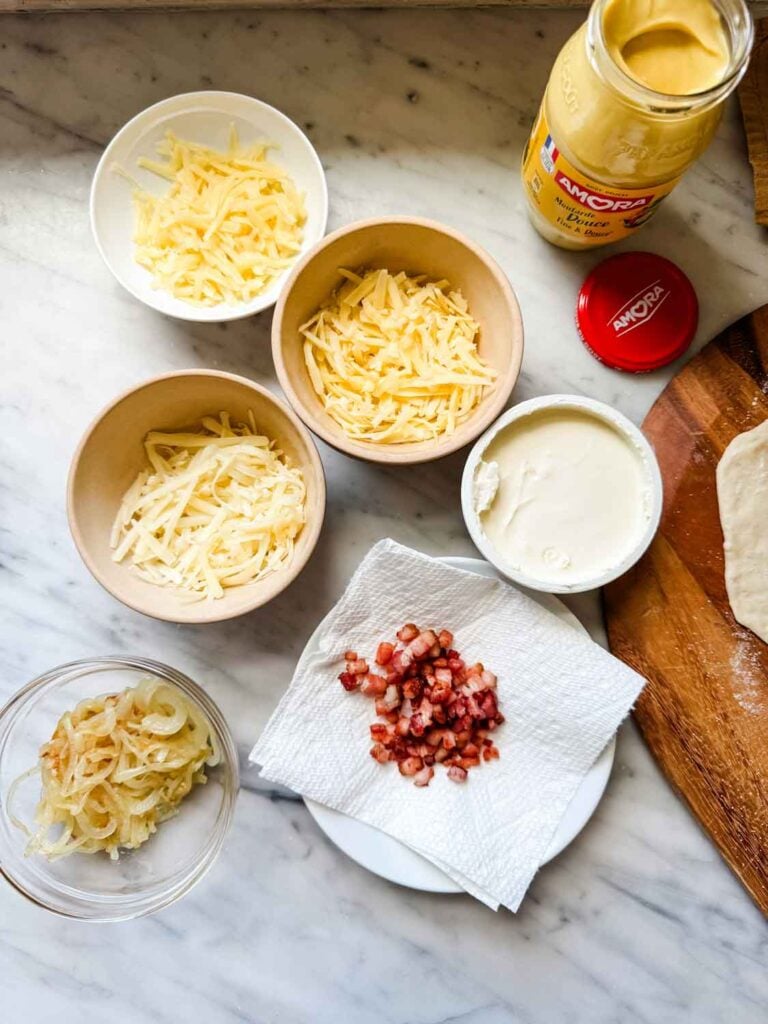 Ingredients in small bowld for pizza.