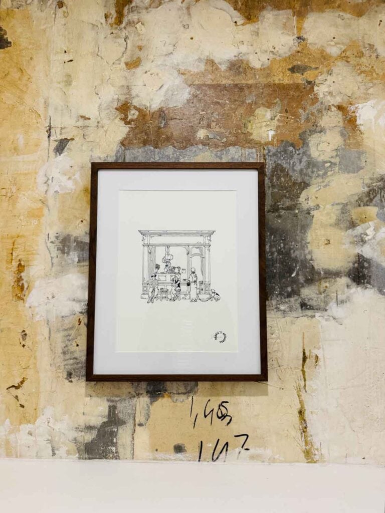 Small sketch framed on distressed walls.
