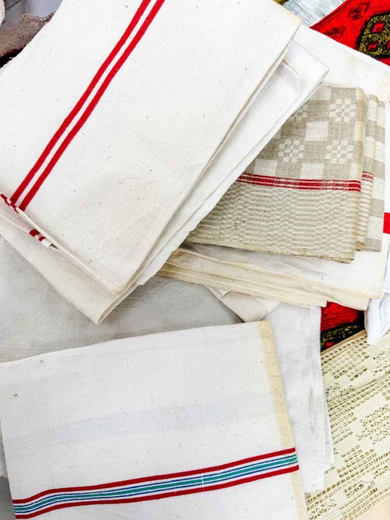 Vintage French tea towels with patterns woven into the fabric are the specialty at this flea market in Paris.