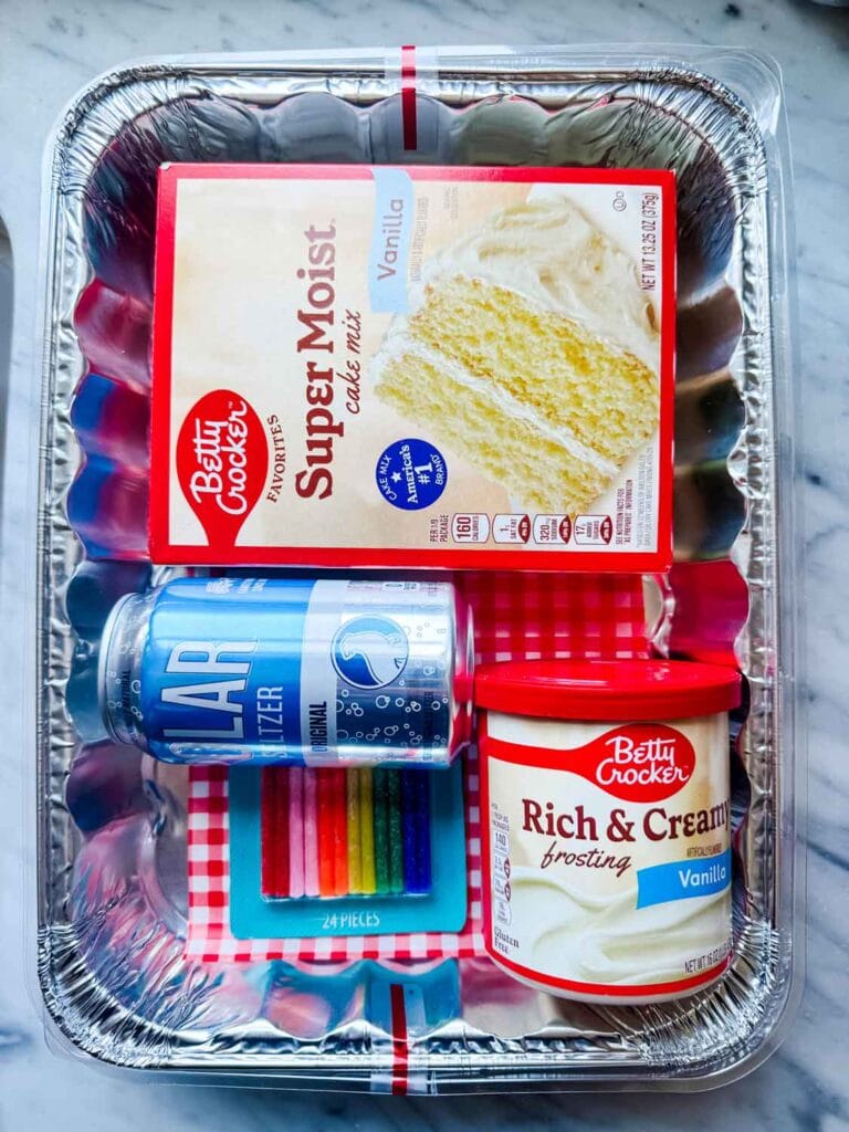 All the items included in a birthday cake kits are packed in a foil baking pan and are ready to be dropped off at a local food pantry.