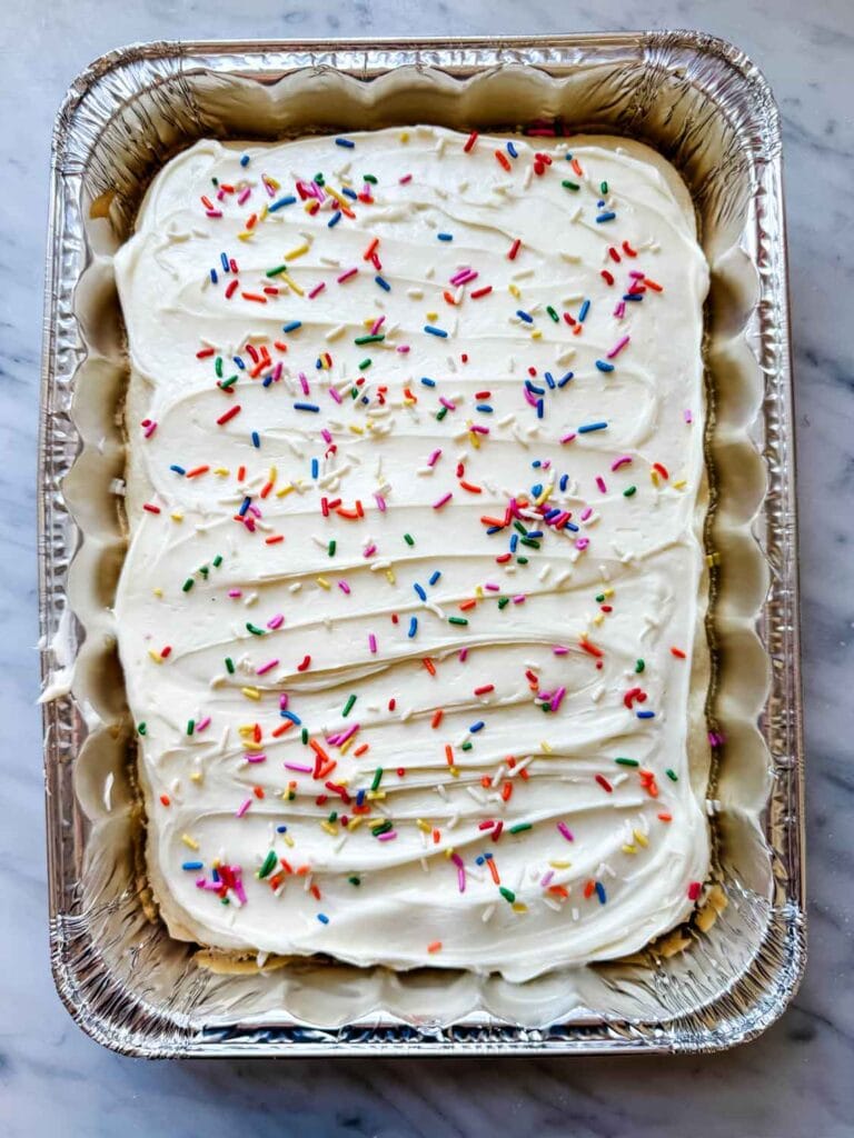 A baked caked with rainbow sprinkles comes from the birthday cake kits that are being assembled for a local food pantry.