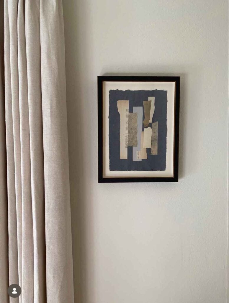 Collage art by carol Estes of Studio Estes on wall next to drapery.