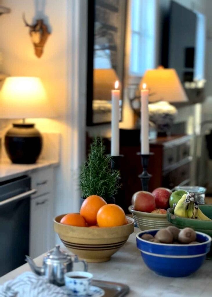 Vintage bowls with fruit in kitchen.