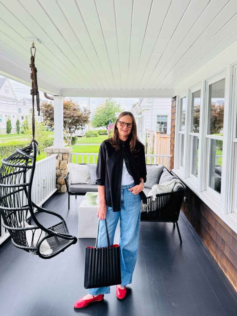 Annie Diamond wearing jeans, GAP big shirt and Warby Parker glasses.