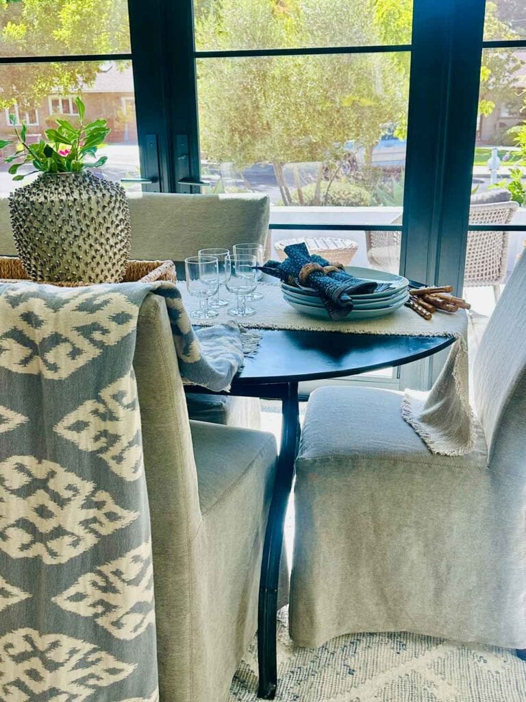Metal dining table, throw on chair,