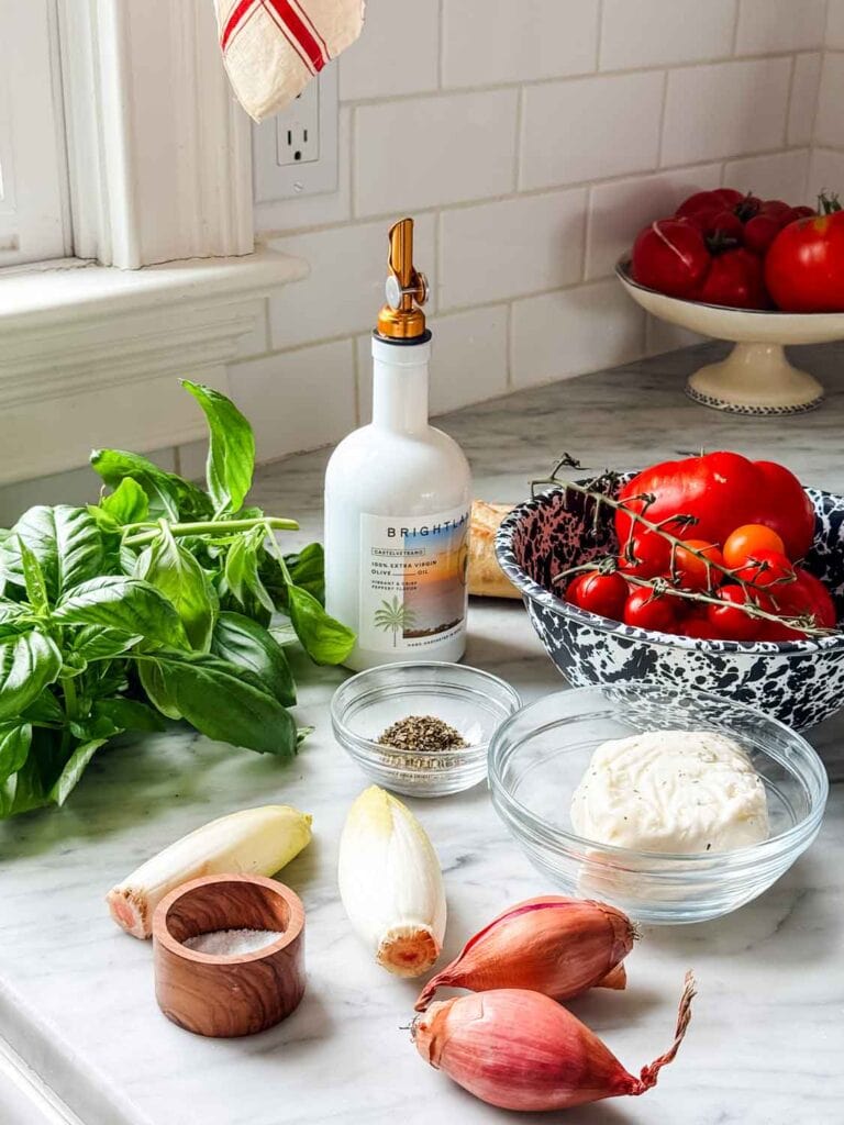 All the ingredients to make Panzanella salad or sitting on the counter and ready to make this delicious meal.