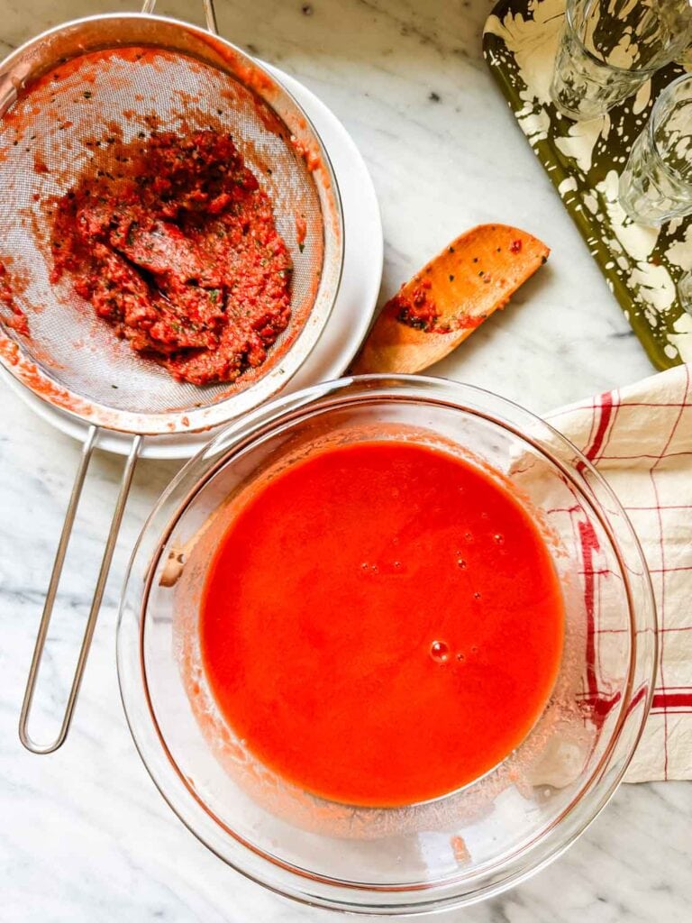 Discard the solids. Smooth tomato gazpacho soup in large bow.
